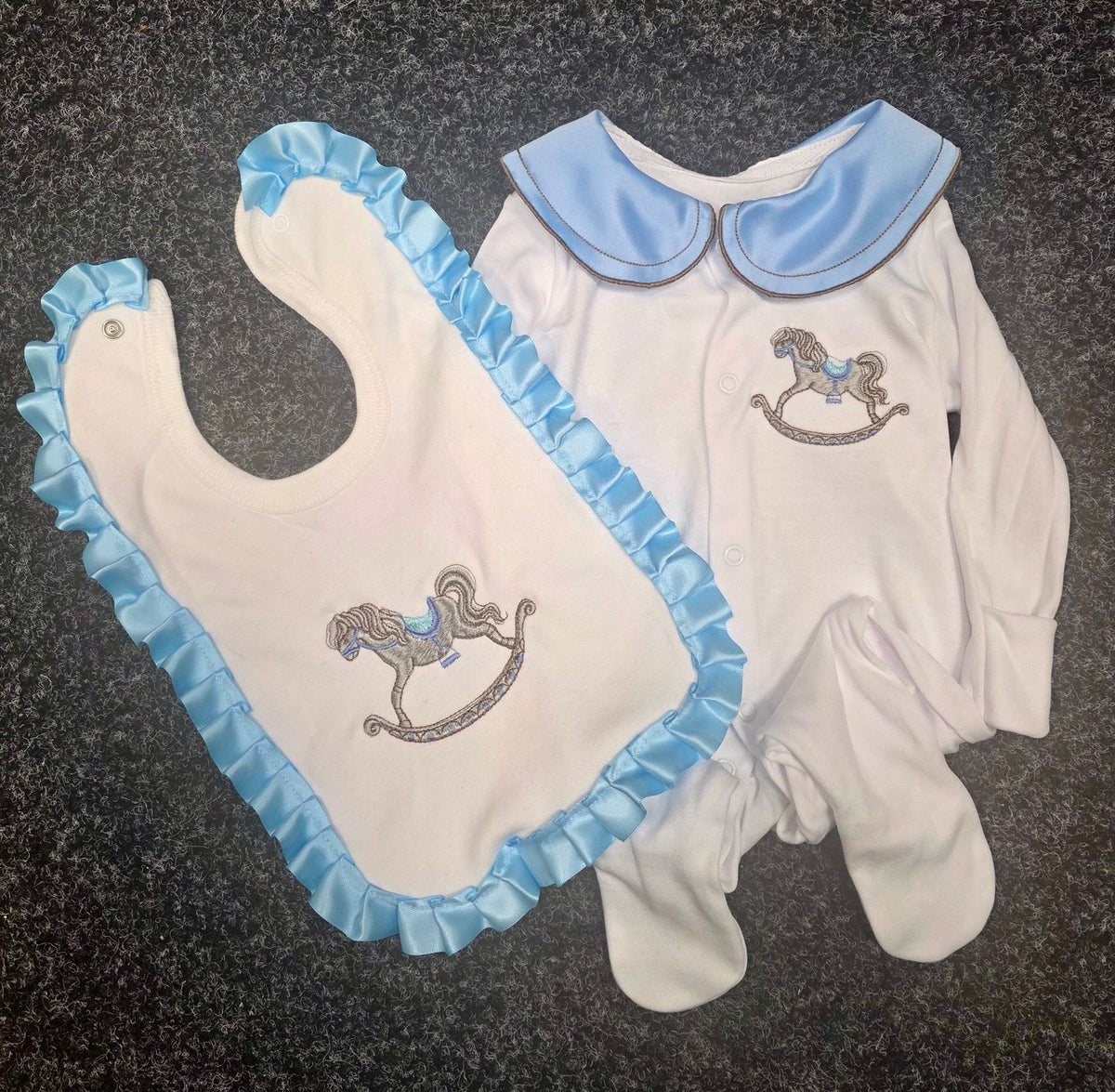 Baby blue rocking horse sleepsuit and frill bib set